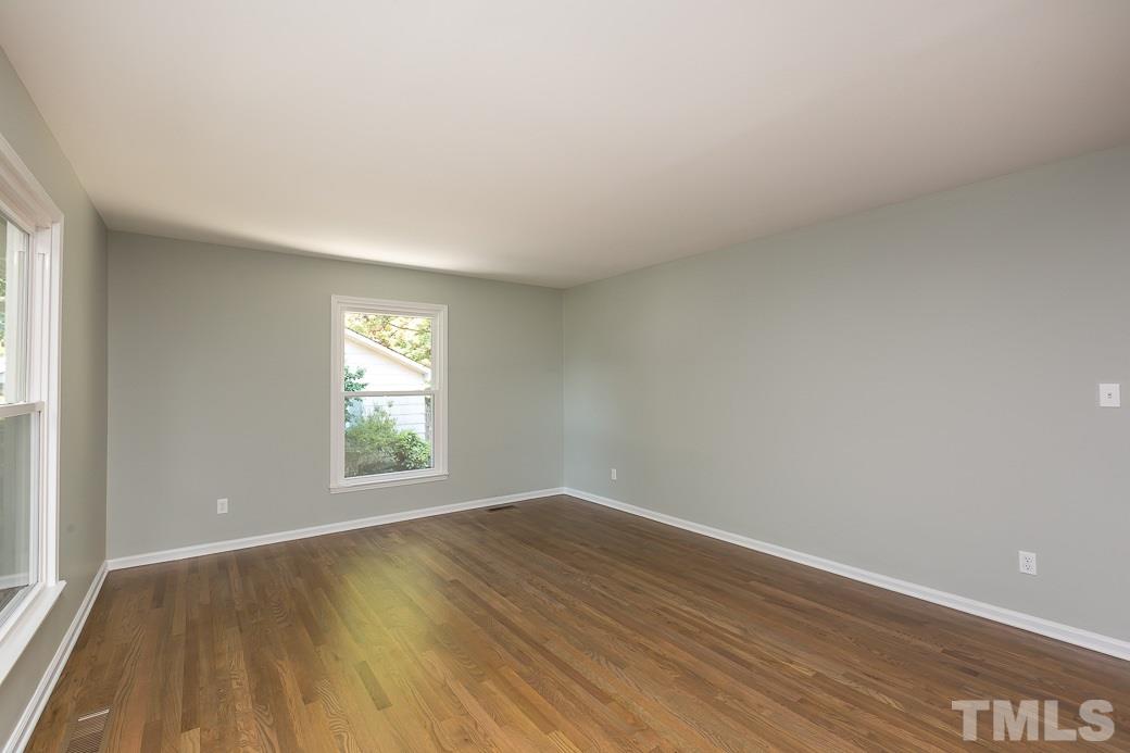 400 Old Farm Road Raleigh, NC 27606 - Photo 4 of 23 Newly finished site-laid hardwood floors, freshly paint, new energy efficient windows allowing lots of natural light.