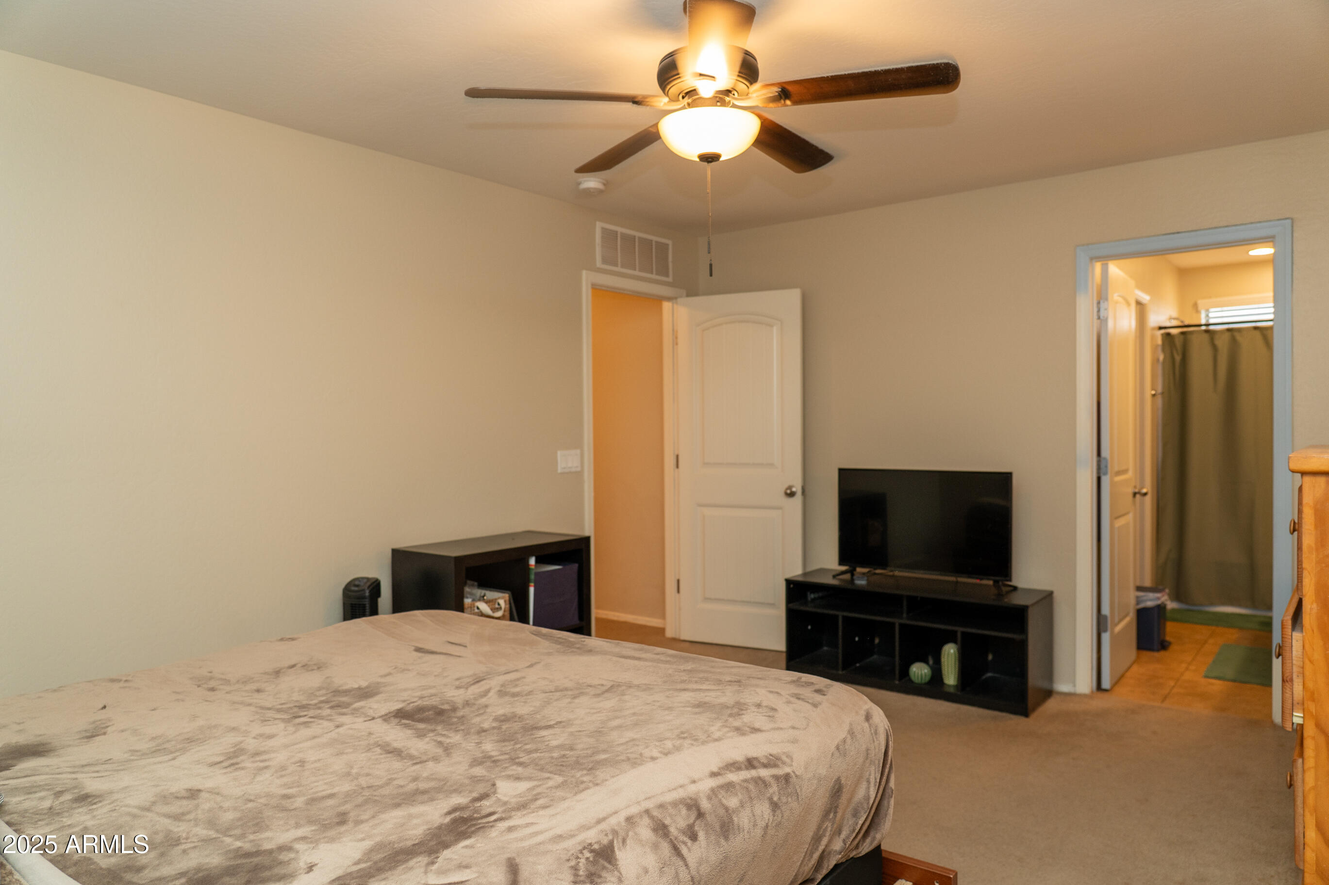 10225 West Camelback Road, Unit 45 Phoenix, AZ 85037 - Photo 12 of 29 Primary Bedroom