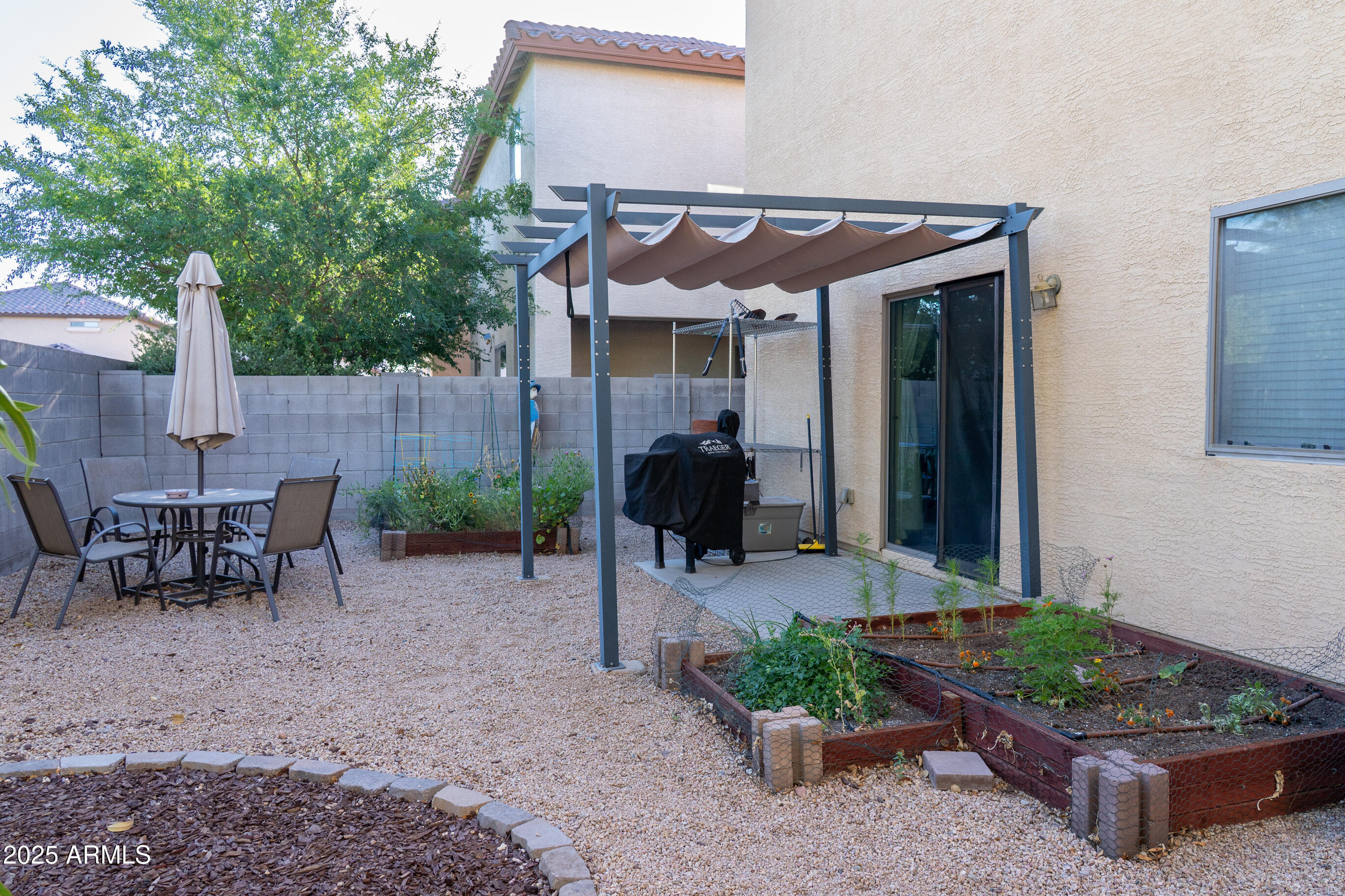 10225 West Camelback Road, Unit 45 Phoenix, AZ 85037 - Photo 26 of 29 Exterior backyard