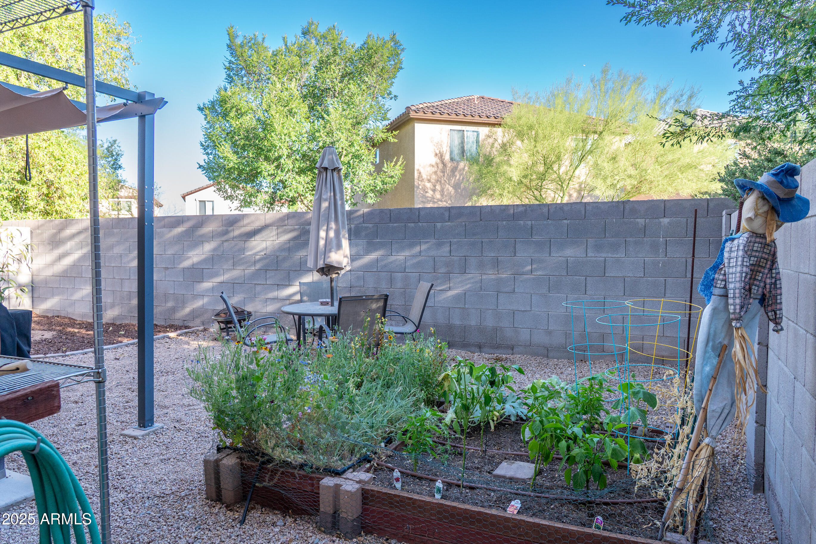 10225 West Camelback Road, Unit 45 Phoenix, AZ 85037 - Photo 27 of 29 Exterior backyard