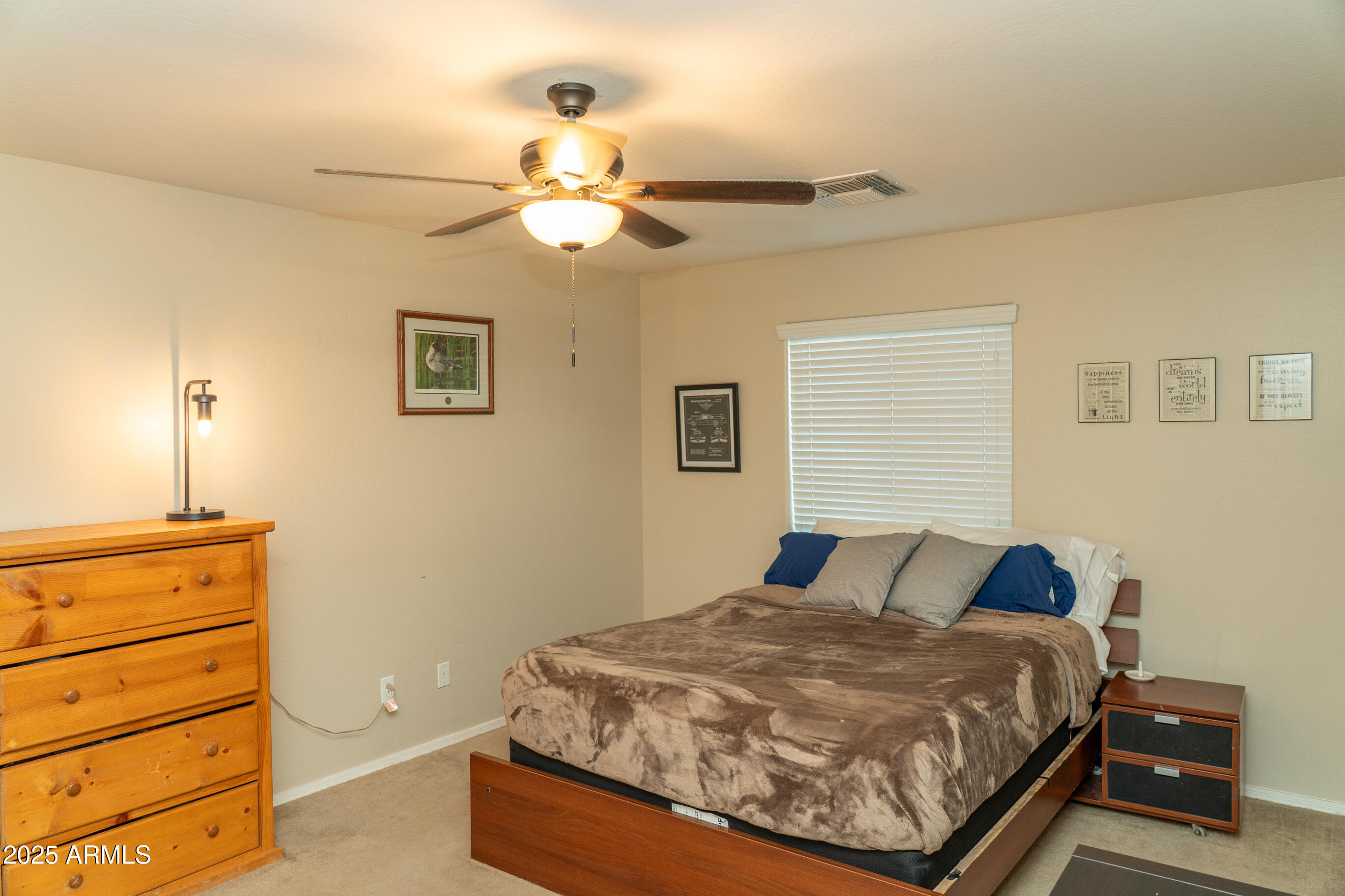 10225 West Camelback Road, Unit 45 Phoenix, AZ 85037 - Photo 10 of 29 Primary bedroom