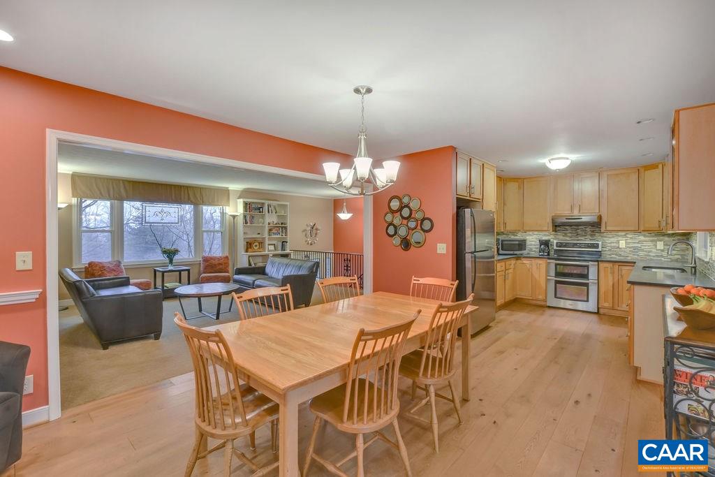 2421 Huntington Road Charlottesville, VA 22901 - Photo 11 of 40 a view of a dining room with furniture window and outside view