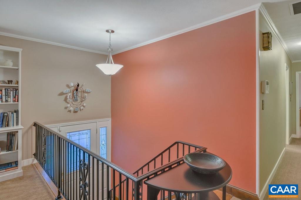 2421 Huntington Road Charlottesville, VA 22901 - Photo 16 of 40 a view of a hallway with furniture