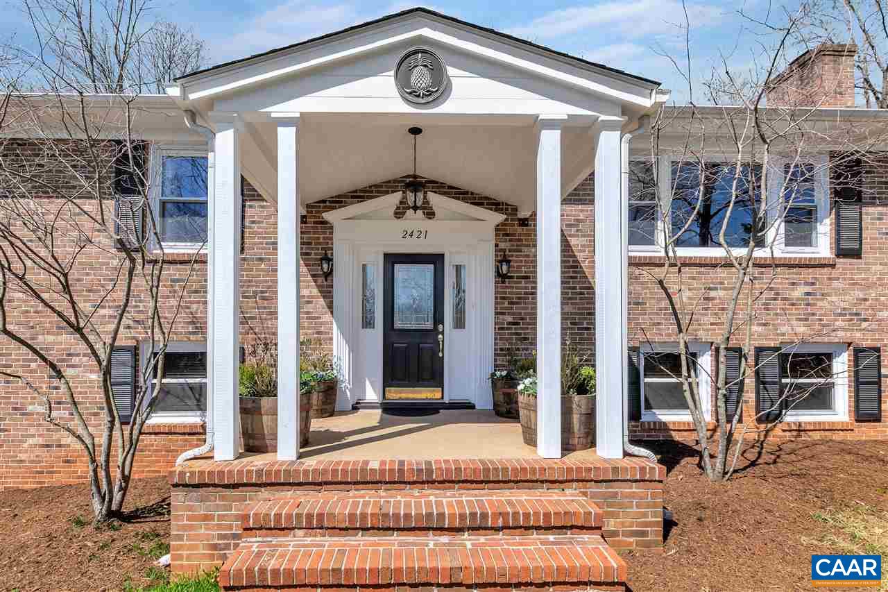 2421 Huntington Road Charlottesville, VA 22901 - Photo 3 of 40 a front view of a building with a porch