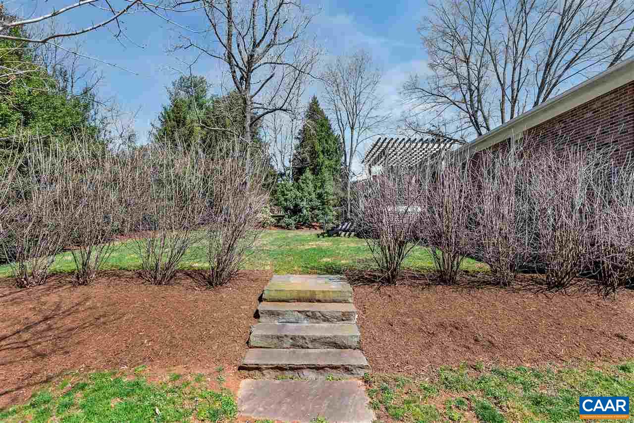 2421 Huntington Road Charlottesville, VA 22901 - Photo 32 of 40 a backyard of a house with lots of green space