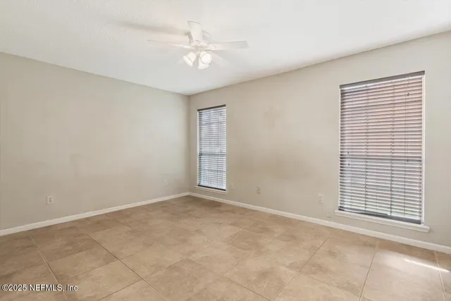 an empty room with windows