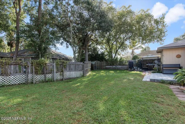 a view of a backyard with a garden