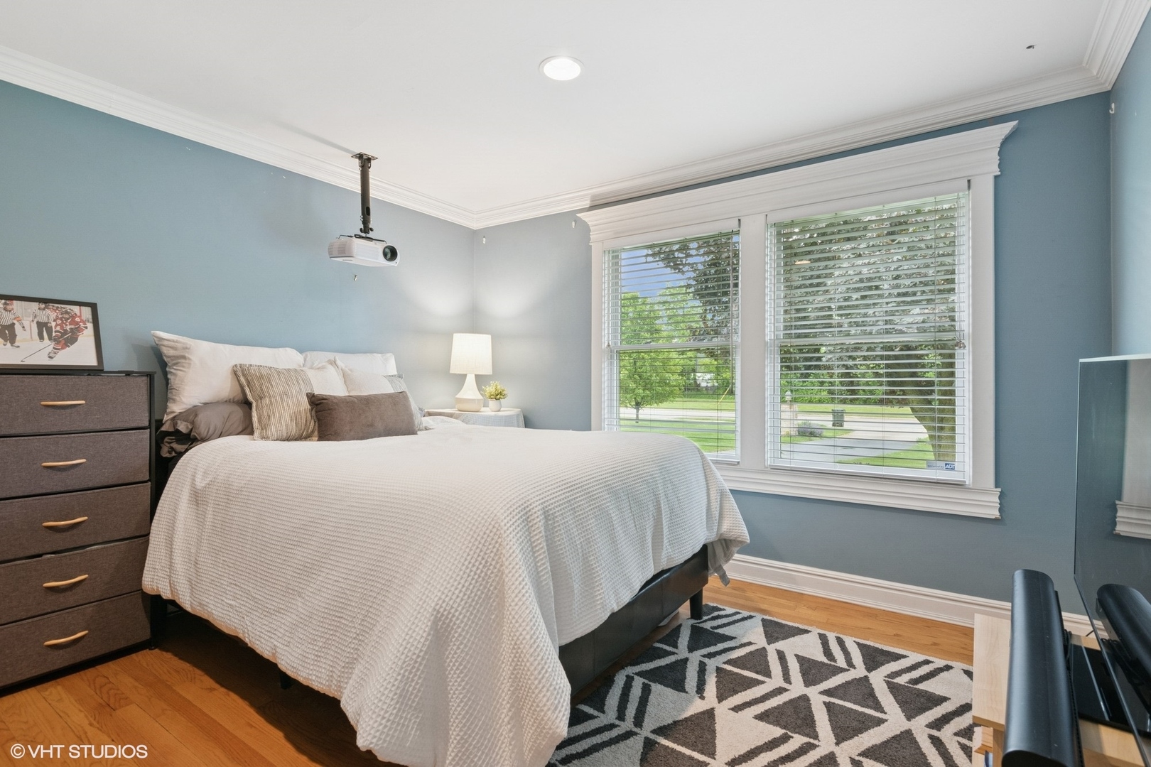 6730 South Madison Street Willowbrook, IL 60527 - Photo 27 of 52 a bedroom with a bed and window