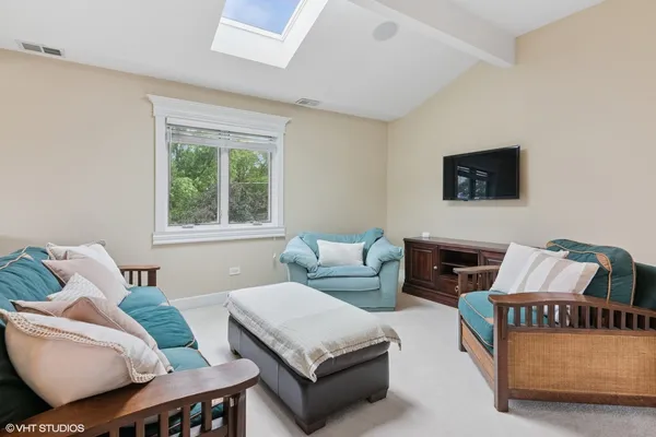 a living room with furniture and a window