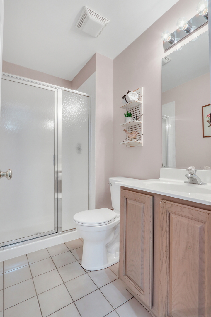 32 Highland Road Grayslake, IL 60030 - Photo 18 of 39 a bathroom with a sink toilet and shower