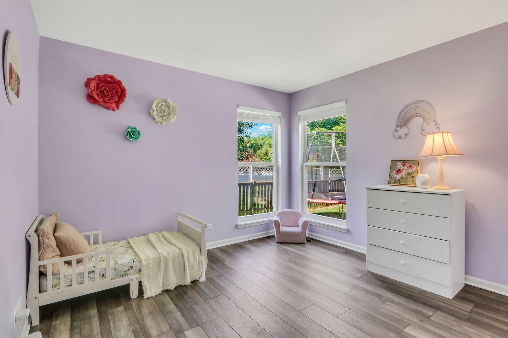 32 Highland Road Grayslake, IL 60030 - Photo 19 of 39 a bedroom with furniture and a wooden floor