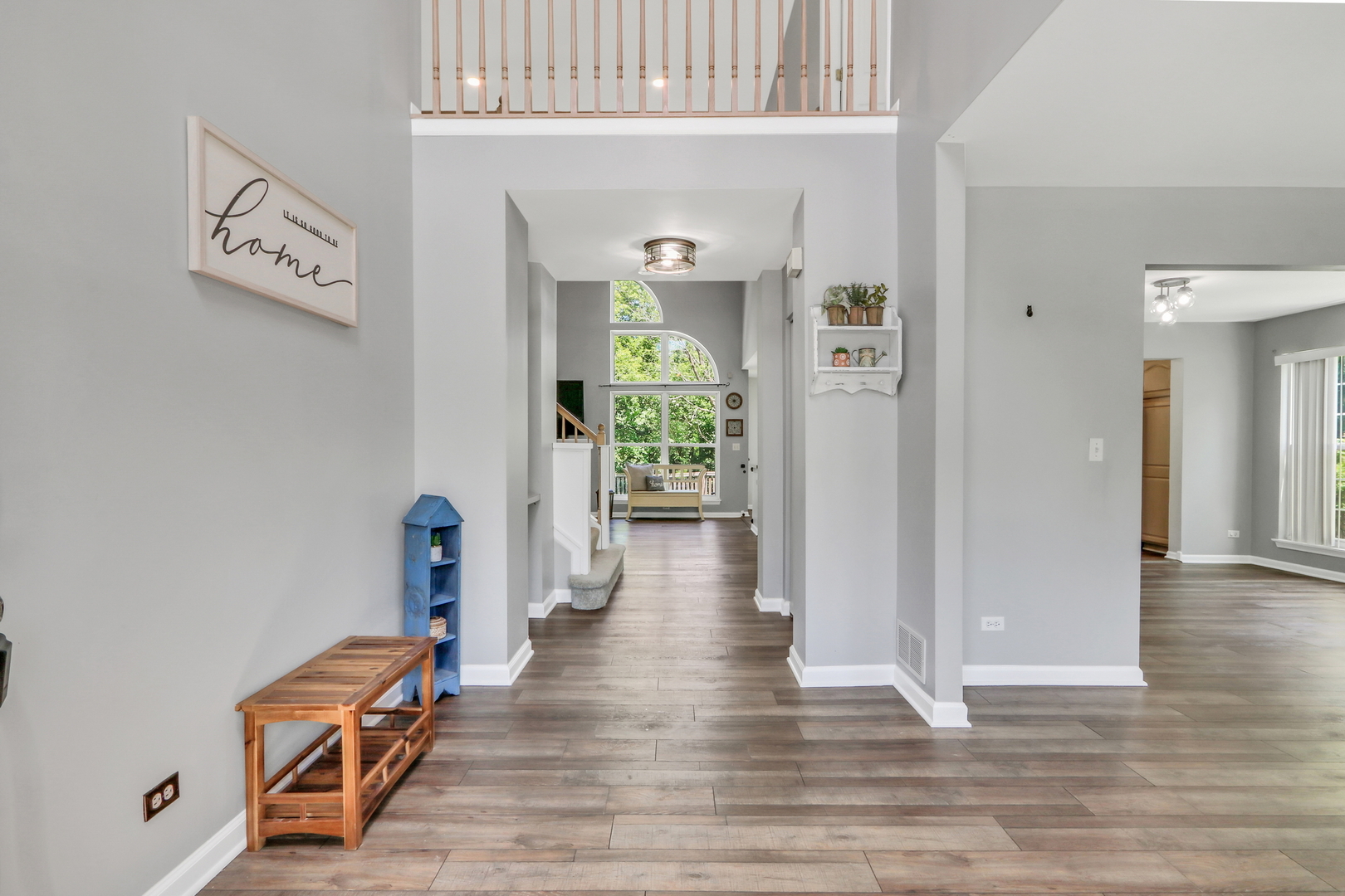32 Highland Road Grayslake, IL 60030 - Photo 2 of 39 a view of a hallway with wooden floor and windows