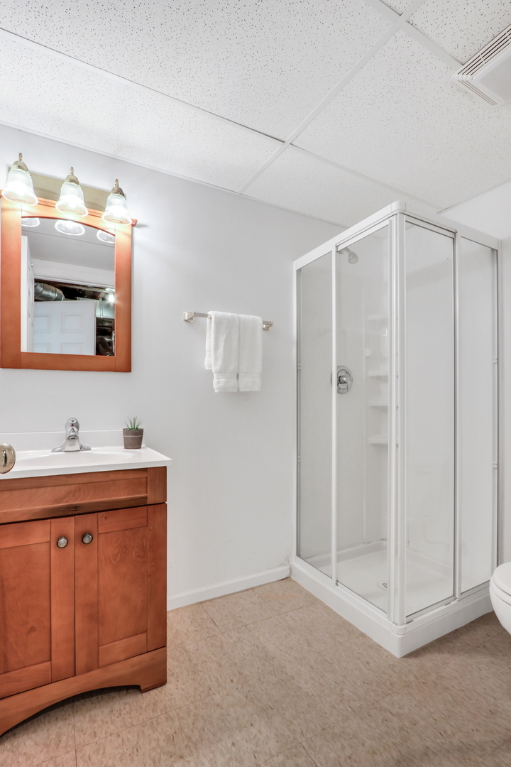 32 Highland Road Grayslake, IL 60030 - Photo 31 of 39 a bathroom with a sink and a mirror