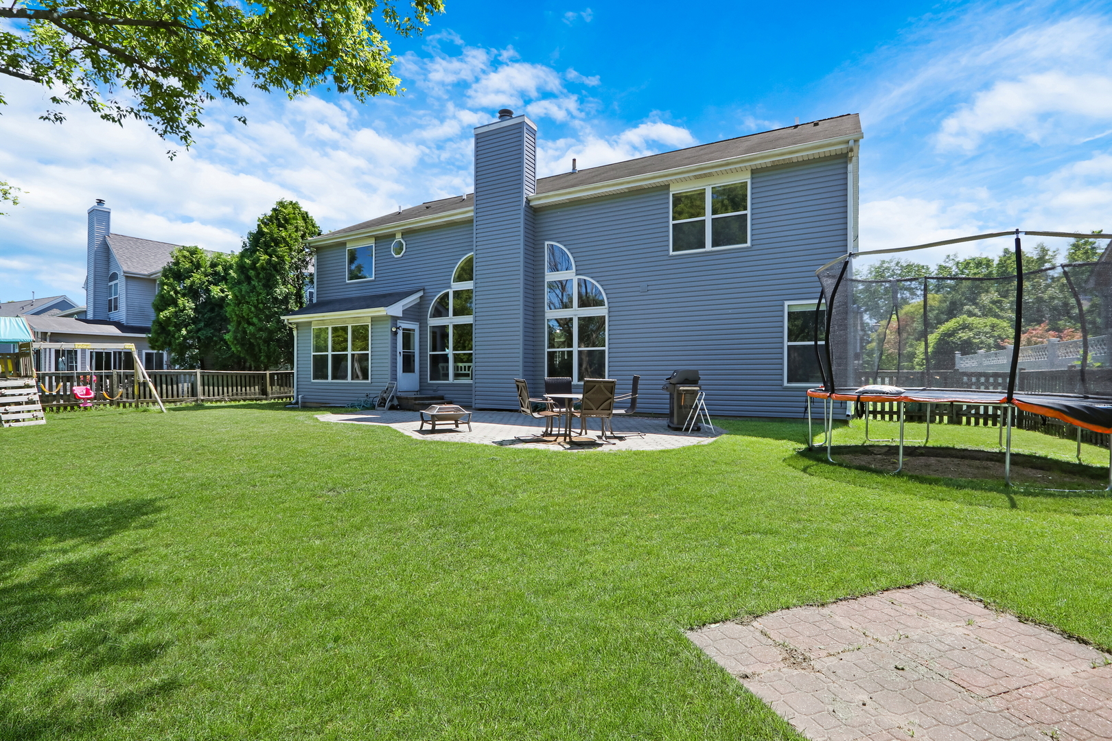 32 Highland Road Grayslake, IL 60030 - Photo 35 of 39 a view of a house with a backyard porch and sitting area