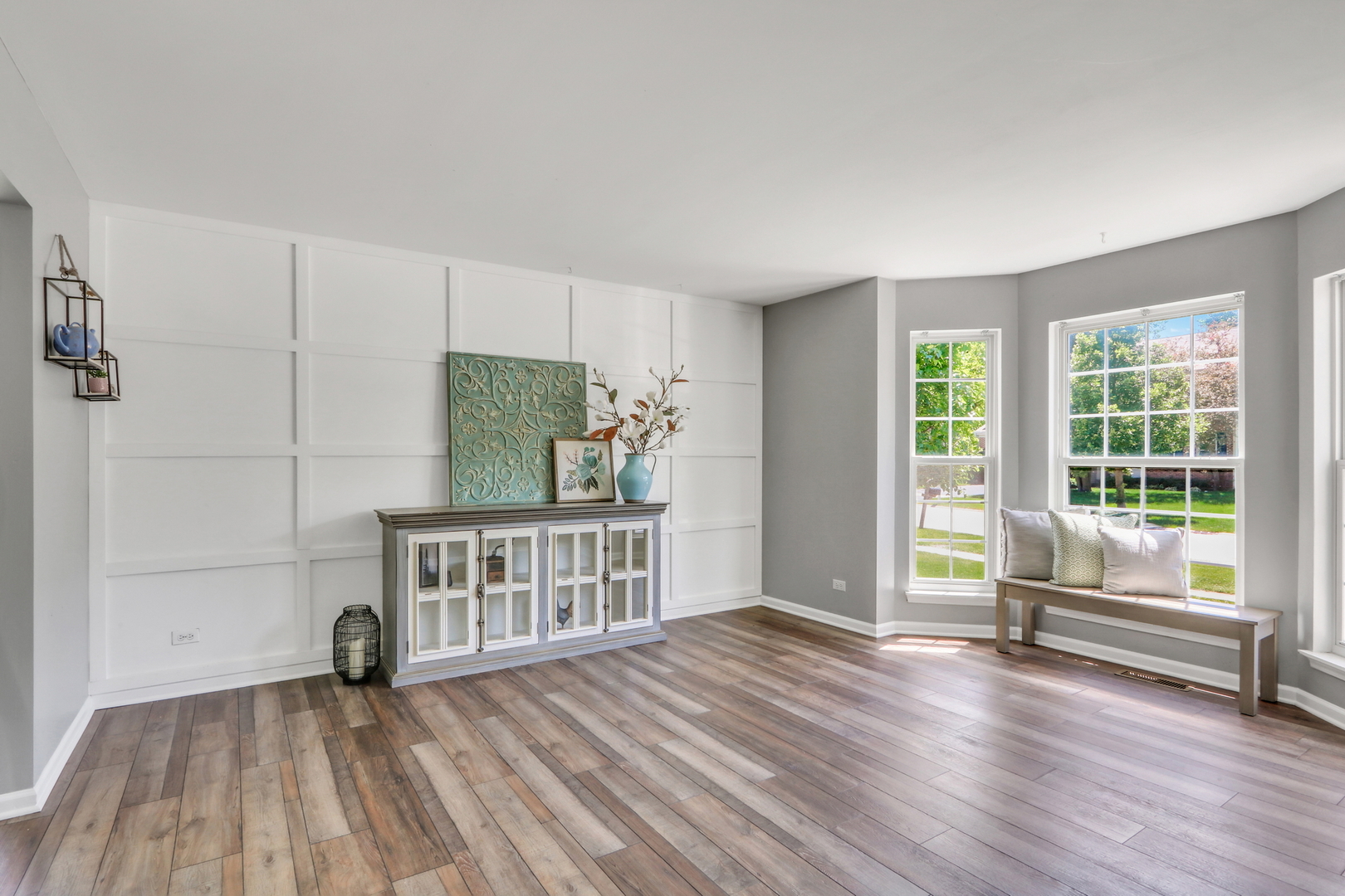 32 Highland Road Grayslake, IL 60030 - Photo 5 of 39 a view of empty room with wooden floor and fan