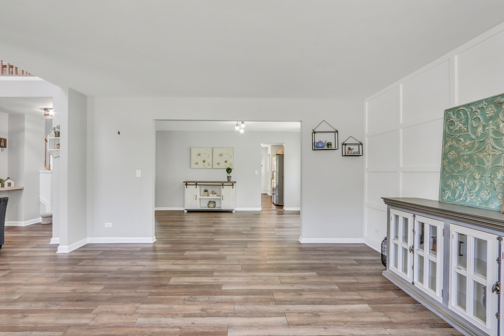 32 Highland Road Grayslake, IL 60030 - Photo 6 of 39 a view of a room with wooden floor and a bathroom