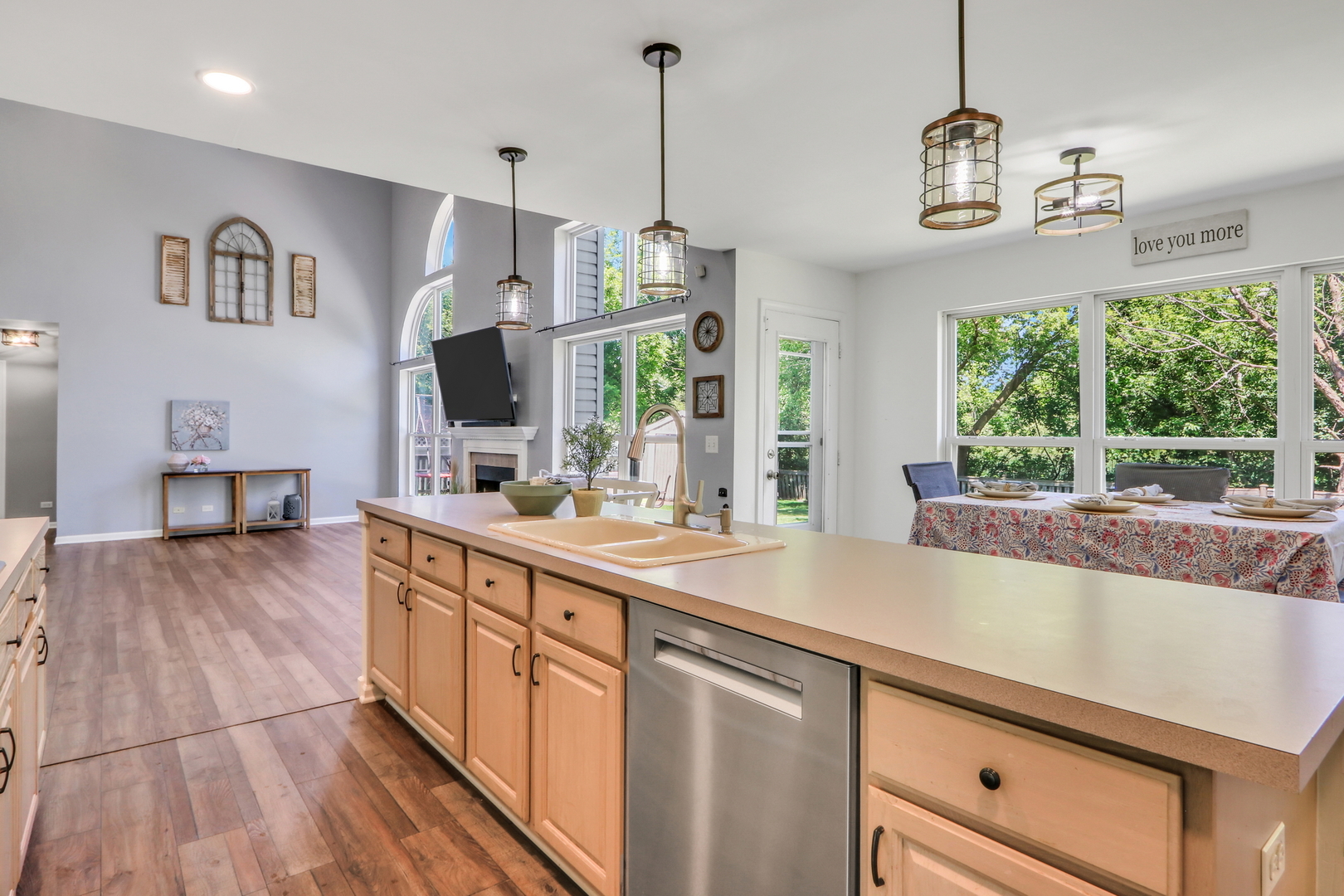 32 Highland Road Grayslake, IL 60030 - Photo 8 of 39 a kitchen with kitchen island granite countertop lots of counter top space and wooden floor