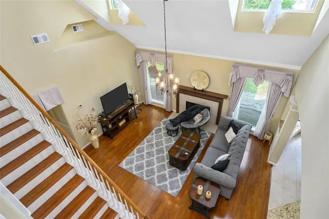 a view of living room with furniture and flat screen tv