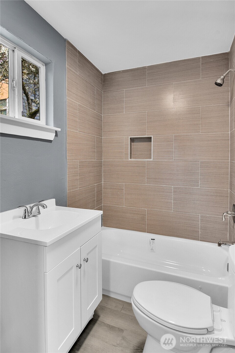 324 26th Avenue South Seattle, WA 98144 - Photo 7 of 7 a bathroom with a sink a toilet and bathtub