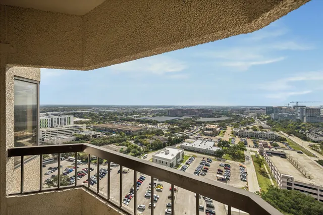 a view of a city from a balcony