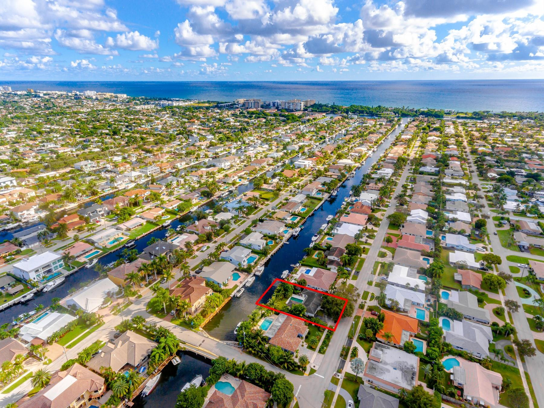 2411 Northeast 46th Street Lighthouse Point, FL 33064 - Photo 9 of 12 a view of a large yard