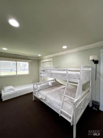 a view of a livingroom with furniture and window