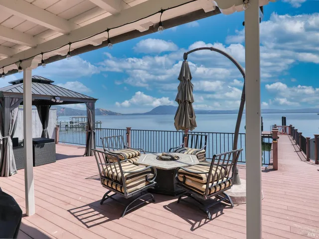 a view of a balcony with furniture