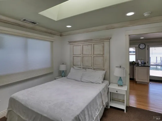 a bedroom with a bed and a view