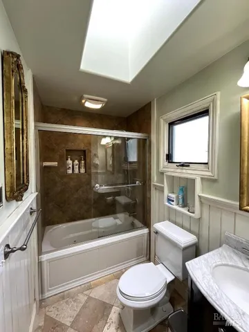 a bathroom with a sink and a toilet