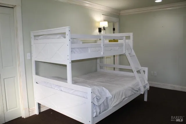 a bed room with a bed and a table