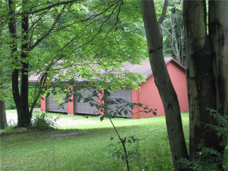 230 Mahood Road Butler, PA 16001 - Photo 3 of 25 Large 3 car detached garage with carport