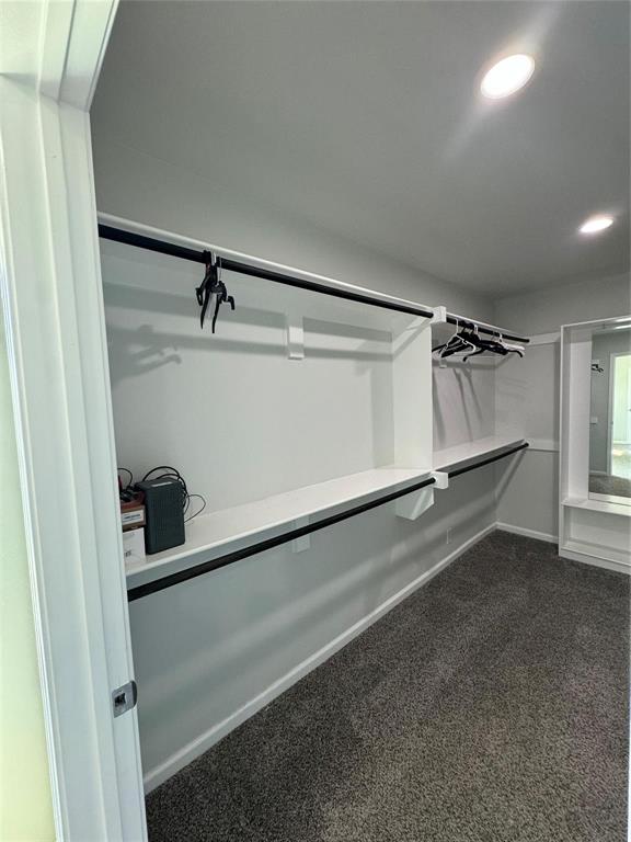 4720 Evening View Drive Granbury, TX 76048 - Photo 16 of 25 a view of a room with racks on the wall