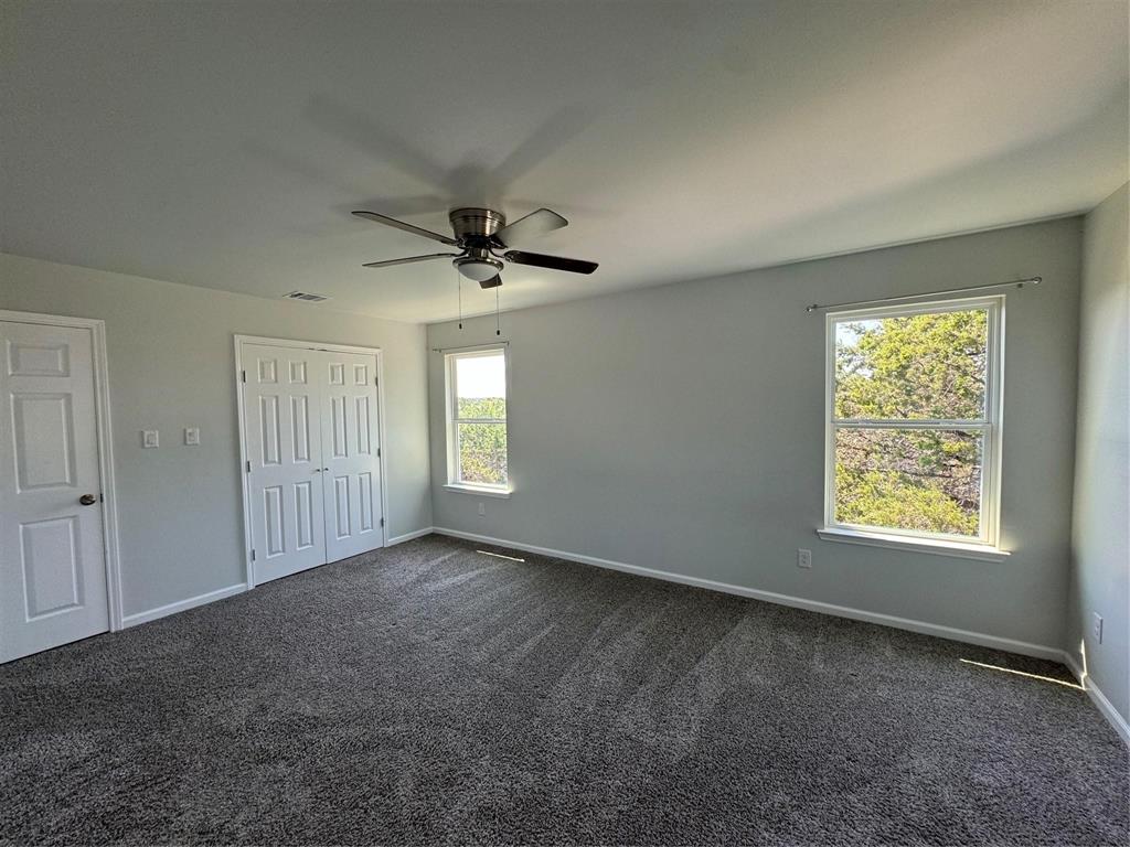 4720 Evening View Drive Granbury, TX 76048 - Photo 21 of 25 a view of an empty room with a window