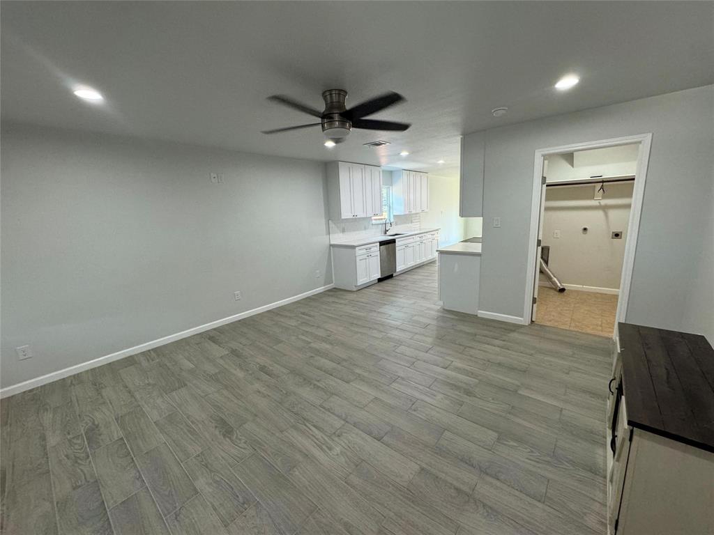 4720 Evening View Drive Granbury, TX 76048 - Photo 4 of 25 a view of empty room with wooden floor