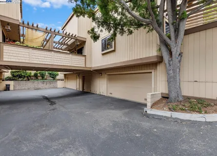 a view of a house with a street