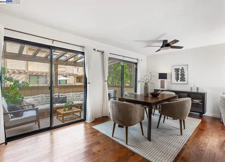 a workspace with furniture window and wooden floor