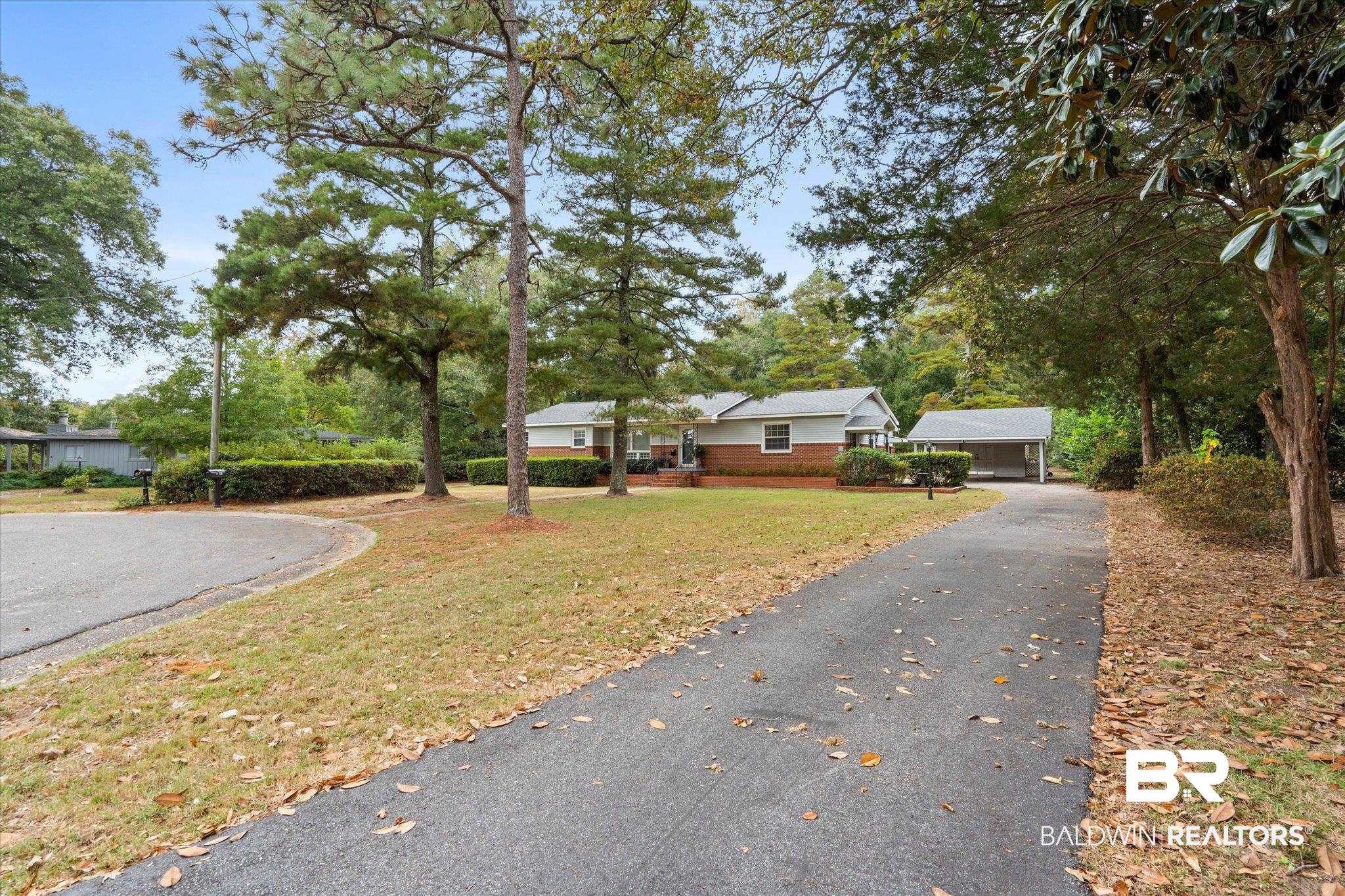 162 Bit And Spur Terrace Mobile, AL 36608 - Photo 28 of 29 View of front of house with a front yard