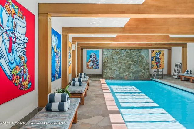 a view of outdoor space with lots of furniture and windows