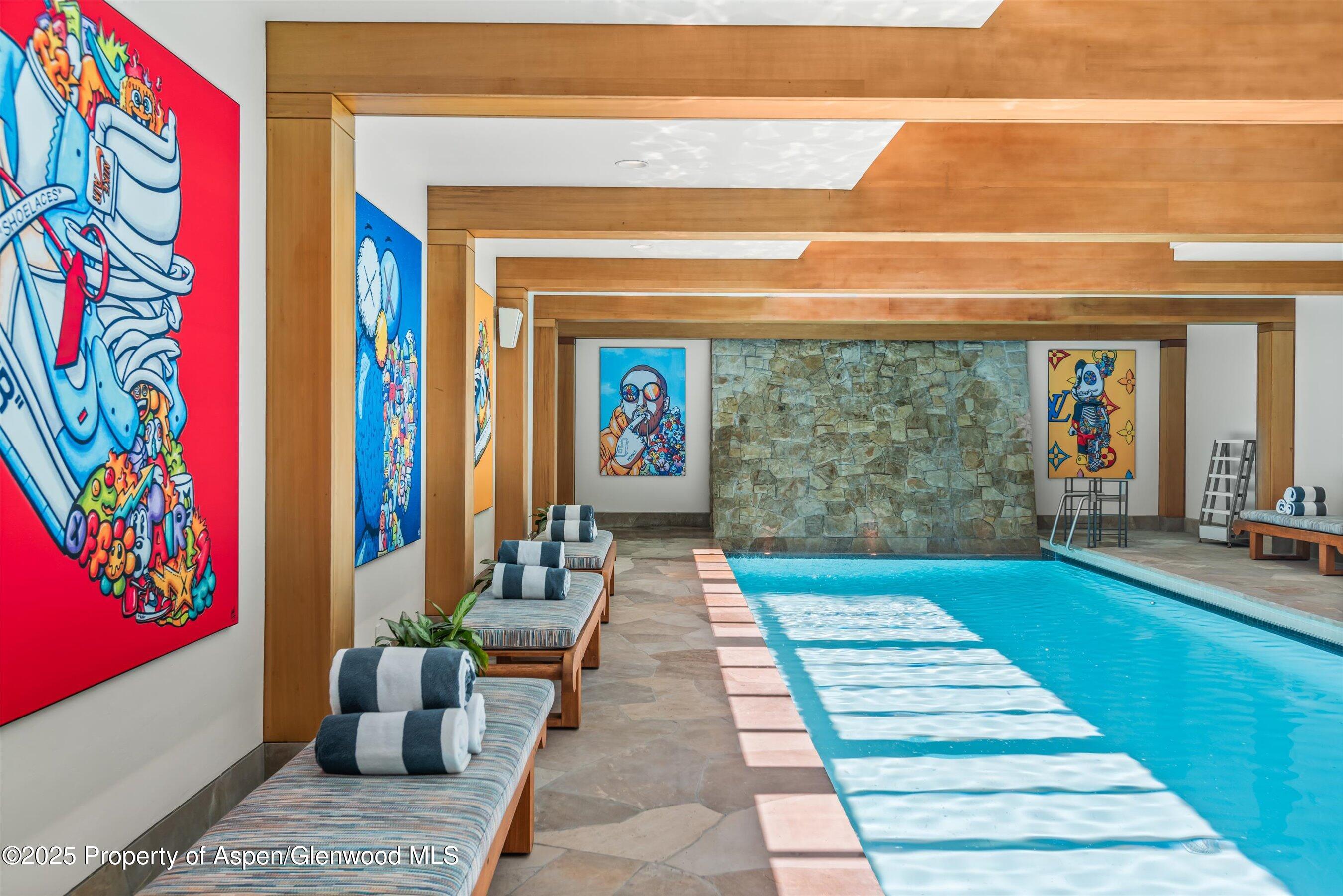 800 Roaring Fork Road Aspen, CO 81611 - Photo 20 of 37 a view of outdoor space with lots of furniture and windows