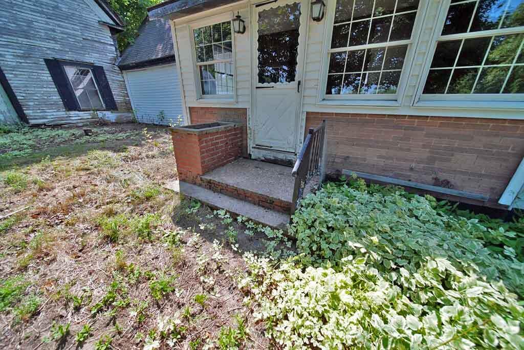 773 Main Street Wytopitlock, ME 04497 - Photo 20 of 56 solid-masonry-step-porch