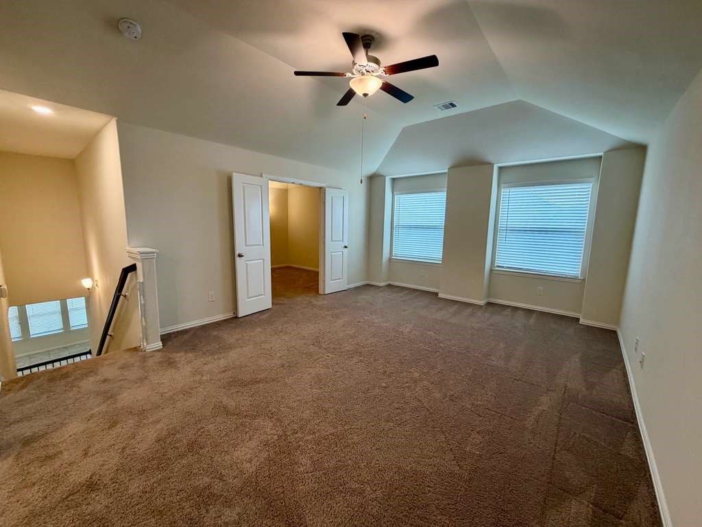 28614 Oakmist Point Lane Katy, TX 77494 - Photo 24 of 42 a view of an empty room with a ceiling fan