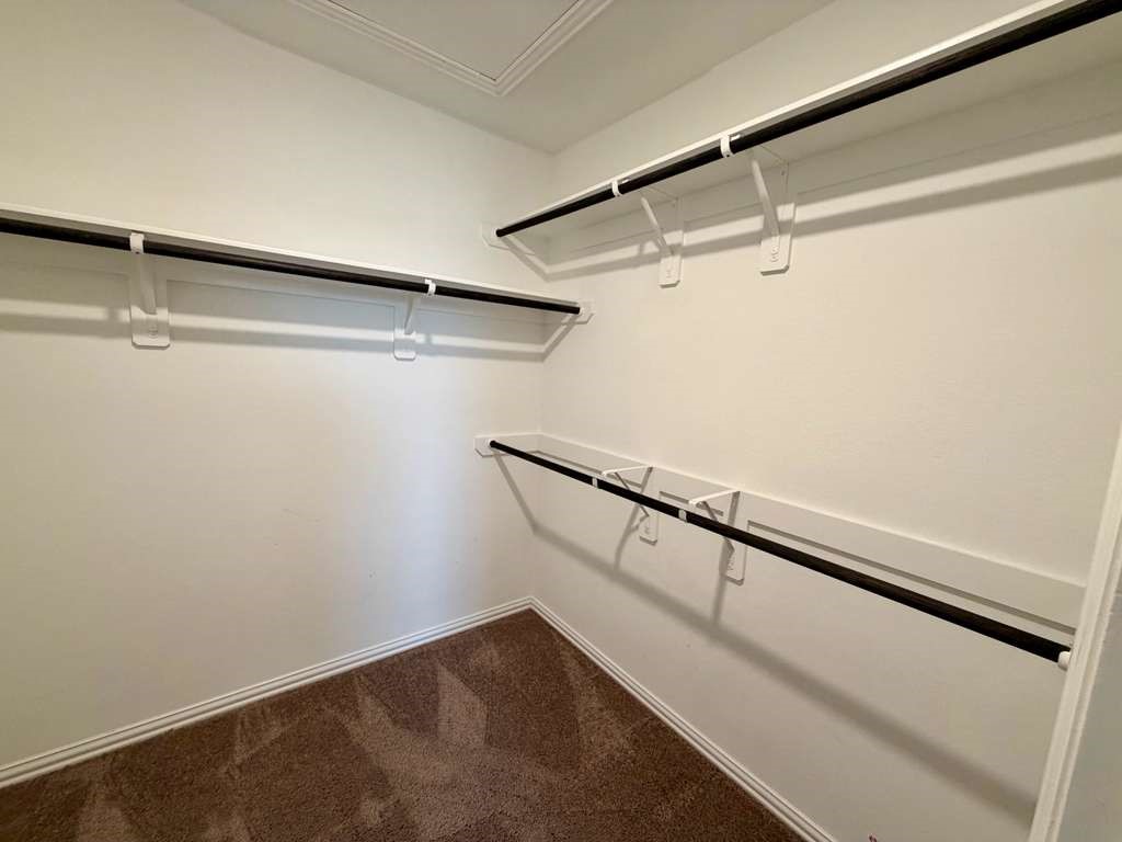 28614 Oakmist Point Lane Katy, TX 77494 - Photo 31 of 42 a view of a room with racks on the wall