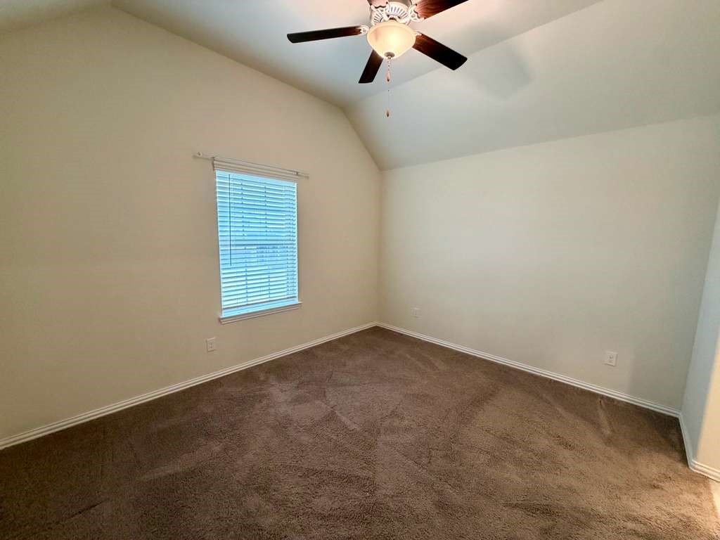 28614 Oakmist Point Lane Katy, TX 77494 - Photo 34 of 42 a view of an empty room with a window