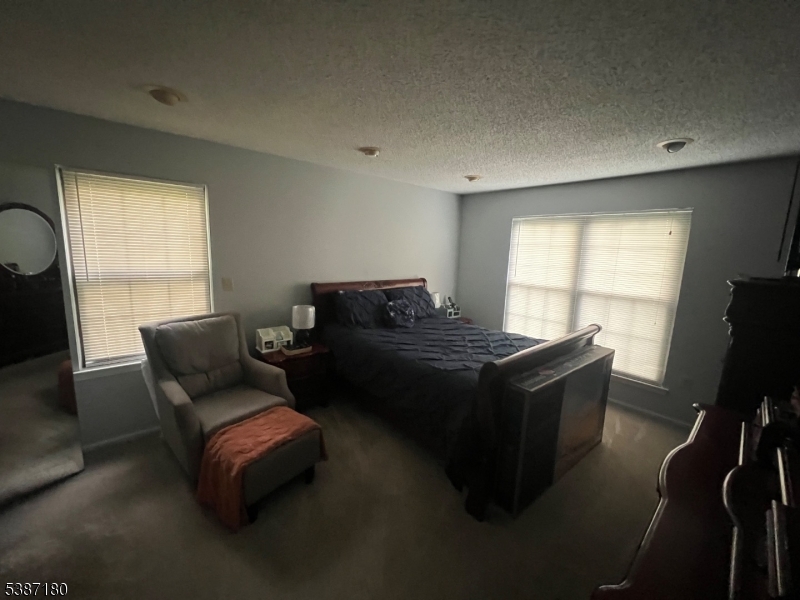 292 English Place Bernards, NJ 07920 - Photo 6 of 10 a living room with furniture wooden floor and a window