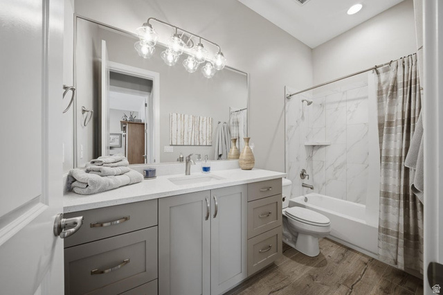 2829 East 1880th Street South St. George, UT 84790 - Photo 29 of 54 Bathroom featuring vanity, shower / tub combo, light wood finished floors, and recessed lighting