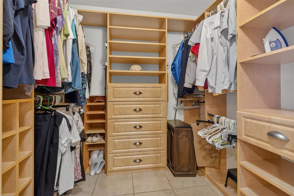 115 Hunting Lodge Drive Inverness, FL 34453 - Photo 33 of 59 a view of walk in closet with clothes and shoes
