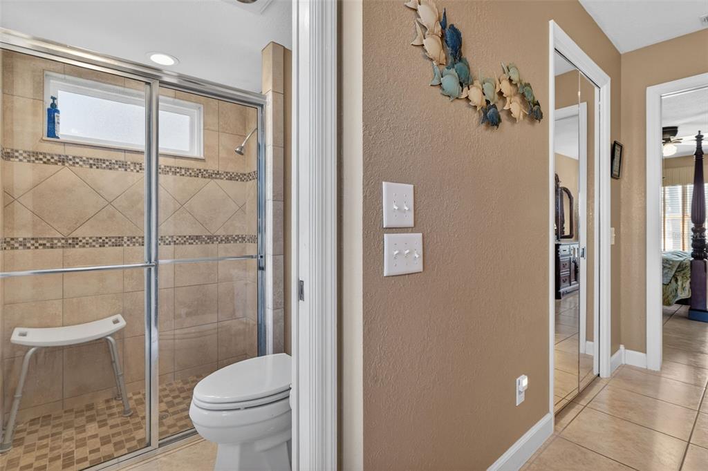 115 Hunting Lodge Drive Inverness, FL 34453 - Photo 34 of 59 a bathroom with a toilet and a shower