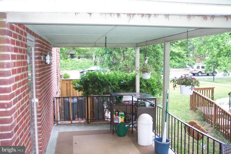7114 York Road Baltimore, MD 21212 - Photo 5 of 15 a view of a porch with furniture and backyard