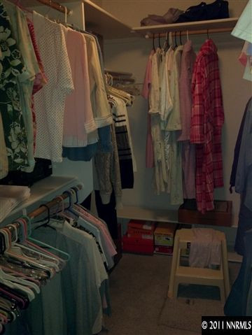 60 Ghost Rider Drive Reno, NV 89511 - Photo 8 of 13 a view of walk in closet with clothes and shoes