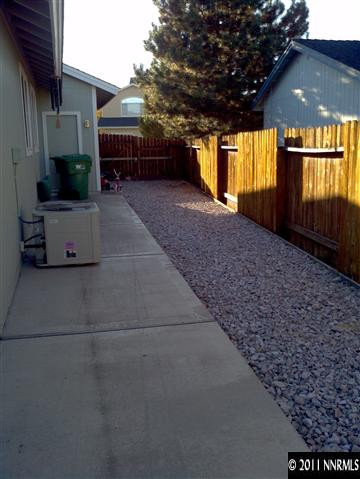 60 Ghost Rider Drive Reno, NV 89511 - Photo 10 of 13 an empty room with windows